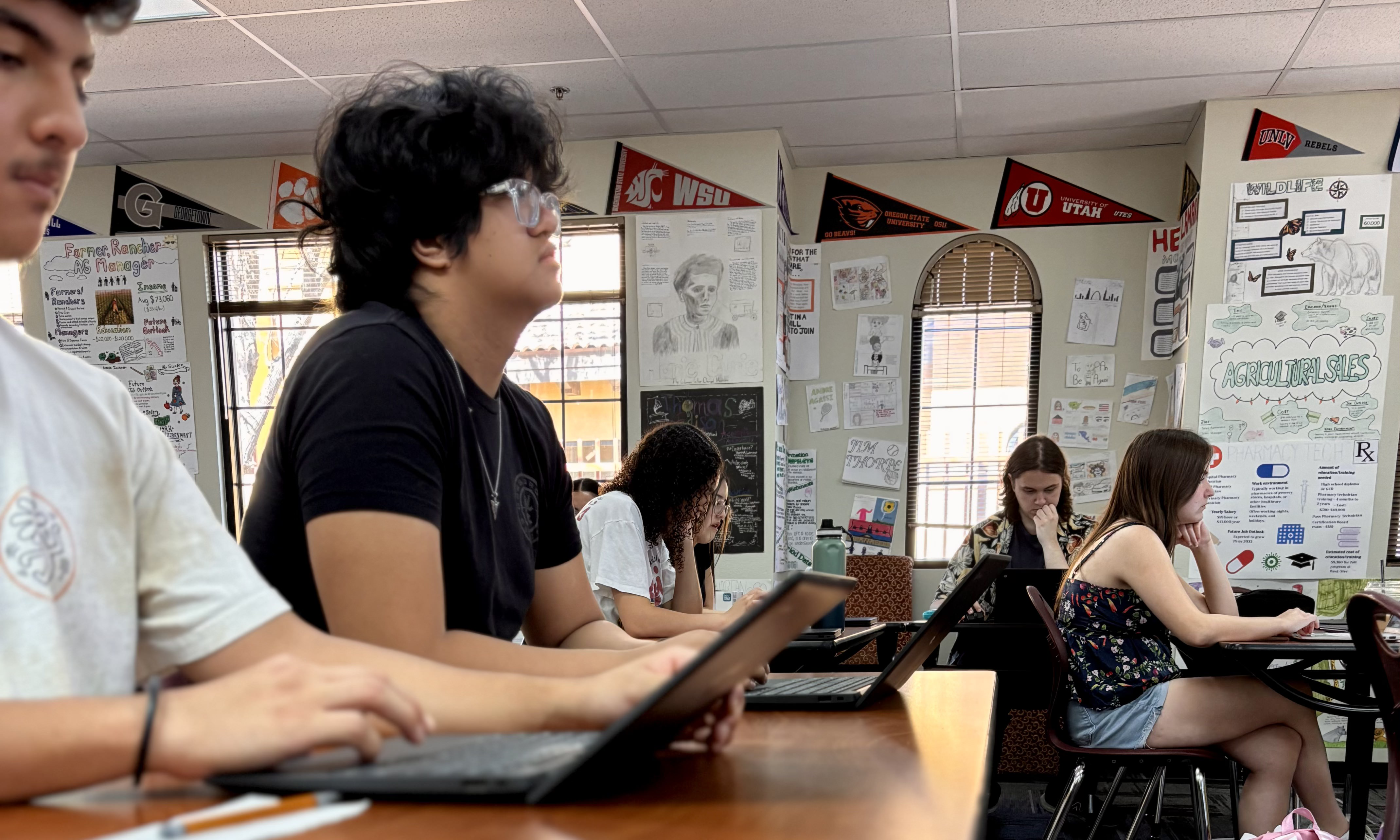 SPOT students listening to class lecture