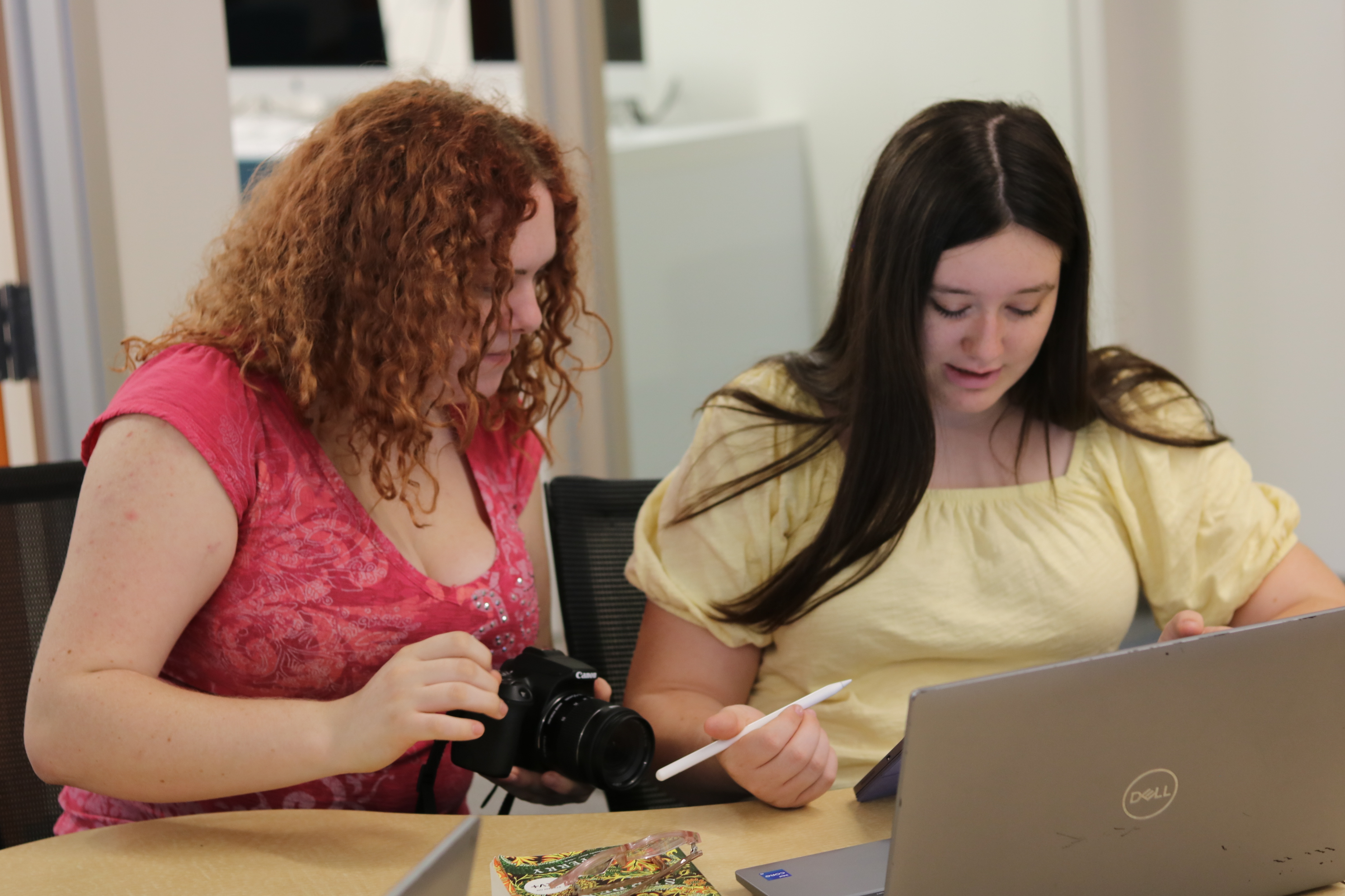 two SPOT students working together.